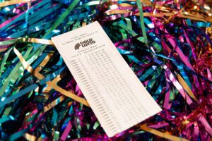 winning ticket on streamers pile