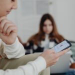Photo by https://kaboompics.com/: https://www.pexels.com/photo/hands-of-a-boy-using-a-smart-phone-6255940/