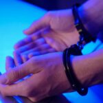 https://www.pexels.com/photo/person-wearing-metal-handcuffs-7773261/