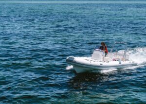 https://www.pexels.com/photo/man-on-motorboat-on-sea-20300496/?utm_source=chatgpt.com
